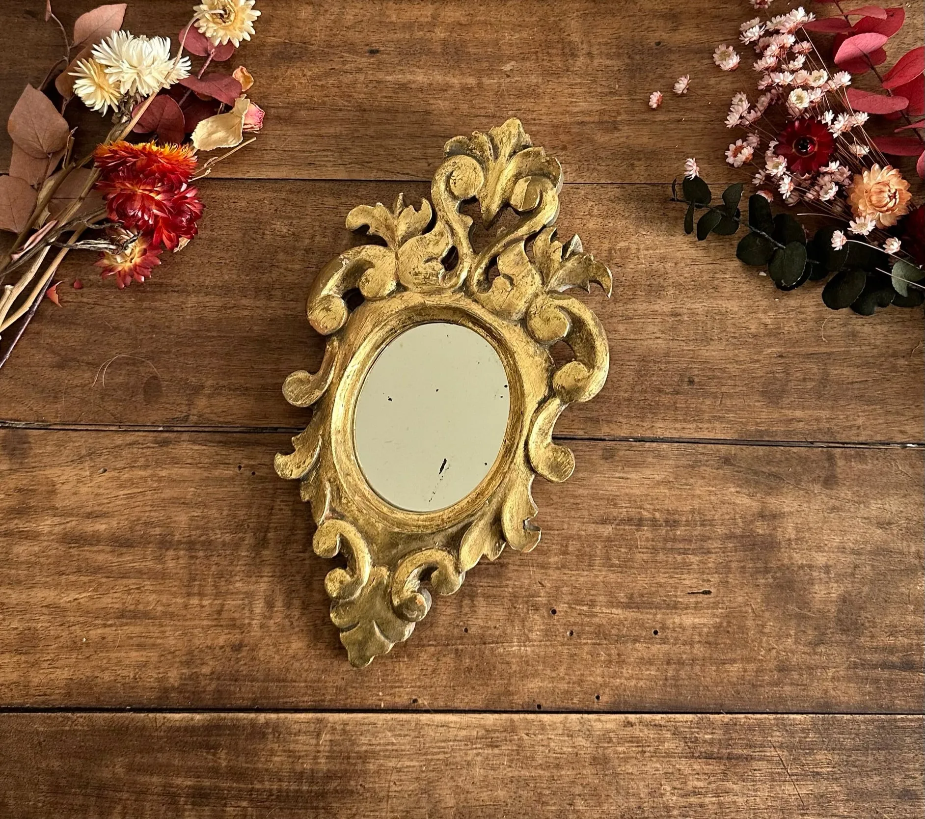 Miroir rococo en bois doré à la feuille d’or taille S